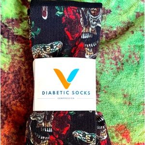Viasox Diabetic Compression Socks print is skulls and serpents.